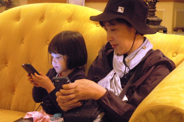 Waiting for the airport bus at the hotel. 