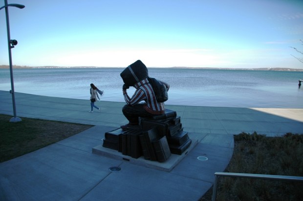 On the shore of Lake Mendota, Bucky Badger contemplates. The statue's name is, "Well Red."