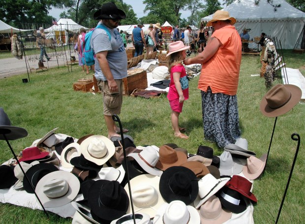 Eden found just the hat that fit her. 