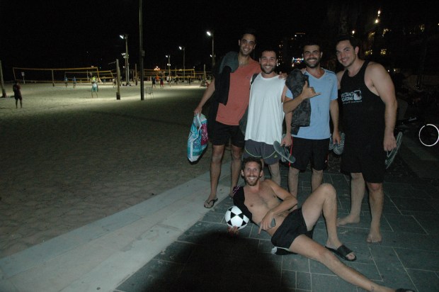 Some of us took a walk along the beach. These volleyball players had just finished playing and asked me to take their picture, so I did.