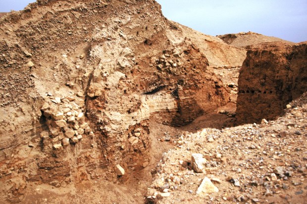 The layers of ancient mud brick walls