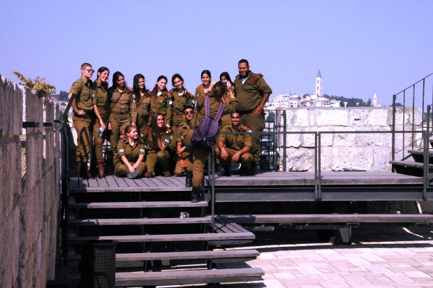 Israeli army soldiers being photographed at the Tower of David Museum.
