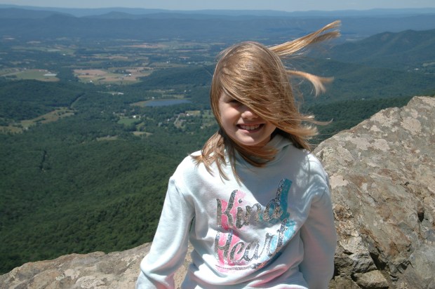 When we got out to climb a mountain, Lana discovered it was kind of windy.