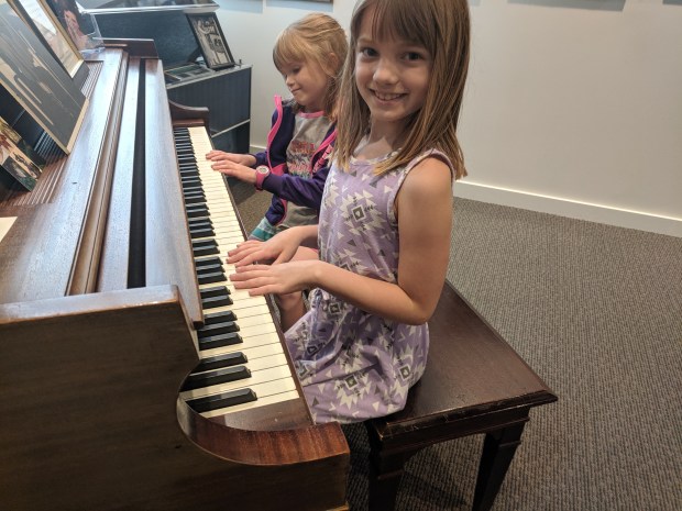 Earlier in the day, at the Winchester Visitors Center, Lana and Audrey got to play Patsy Cline's piano.