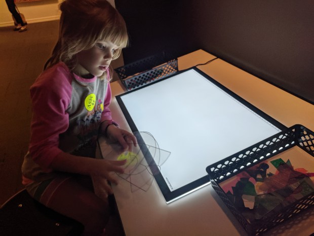 At the Museum of the Shenandoah Valley, there was a Tiffany Glass exhibit with a light table for kids to experiment with colors and shapes.