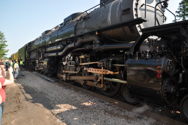 It has 16 drive wheels, eight on each side, in groups of four.