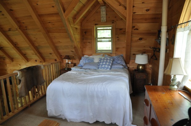 The cabin is rustic and cozy.