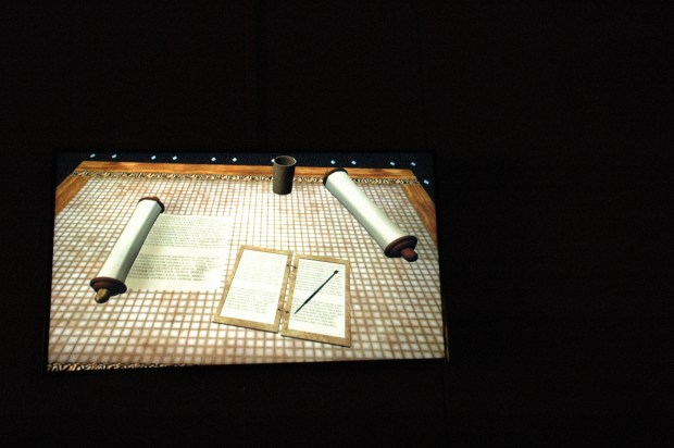 First century writing tools: scrolls plus a diptych and stylus. 