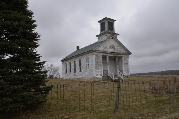 Final stop for this road trip, the church and church yard where there are many family burials. As we walked up, a bald eagle flew away.