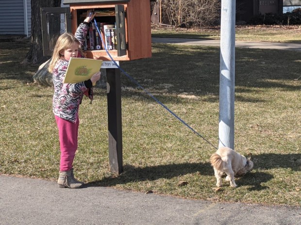 Audrey helped me walk Basher, and discovered the Little Free Library at the end of the block.