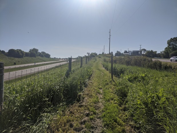 The Trail crosses over US highway 18/151 on the County M highway bridge. 