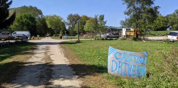 a local salvage yard owner rounded up a car hood to carry his own important message.