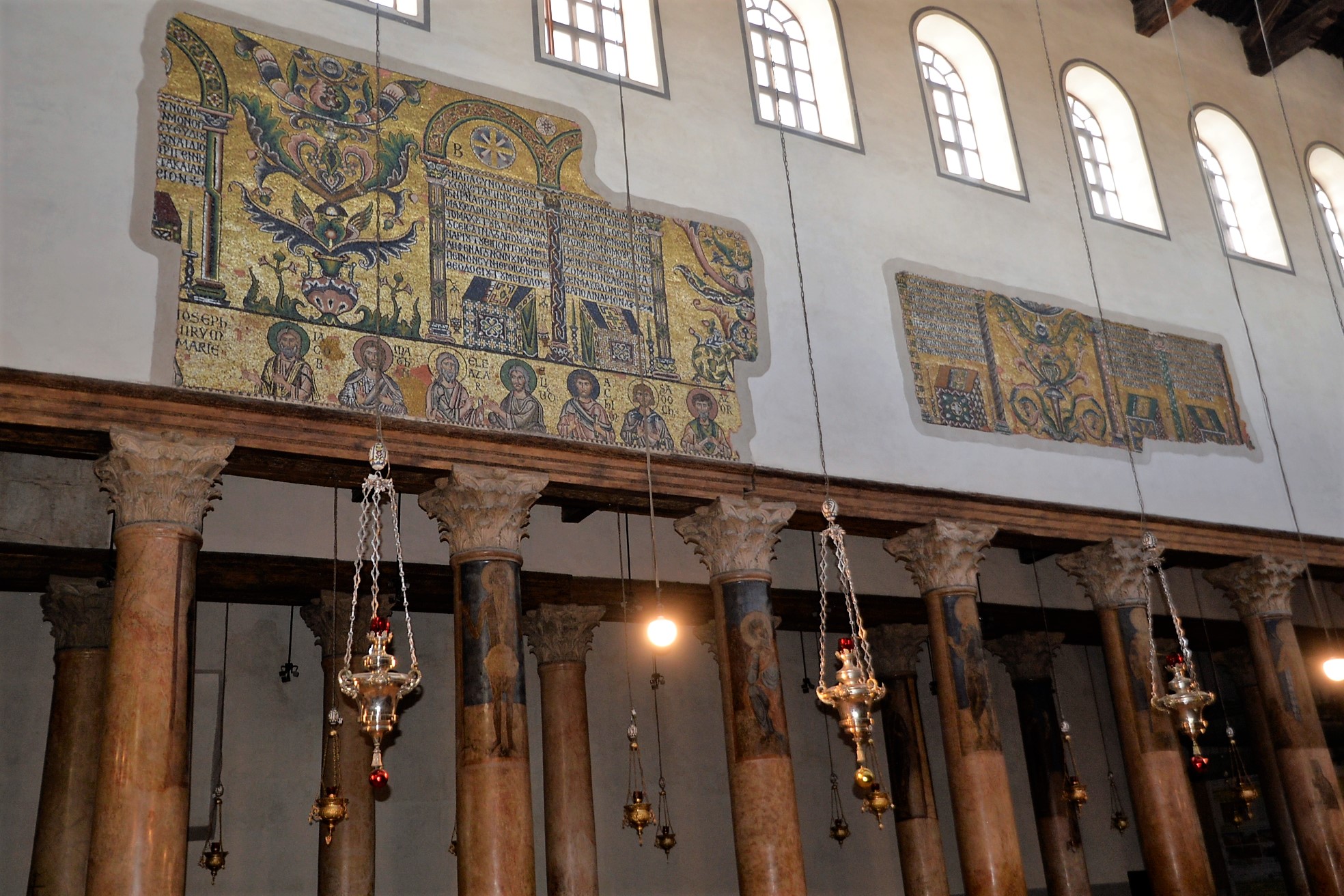 The mosaics high on the walls have been restored.