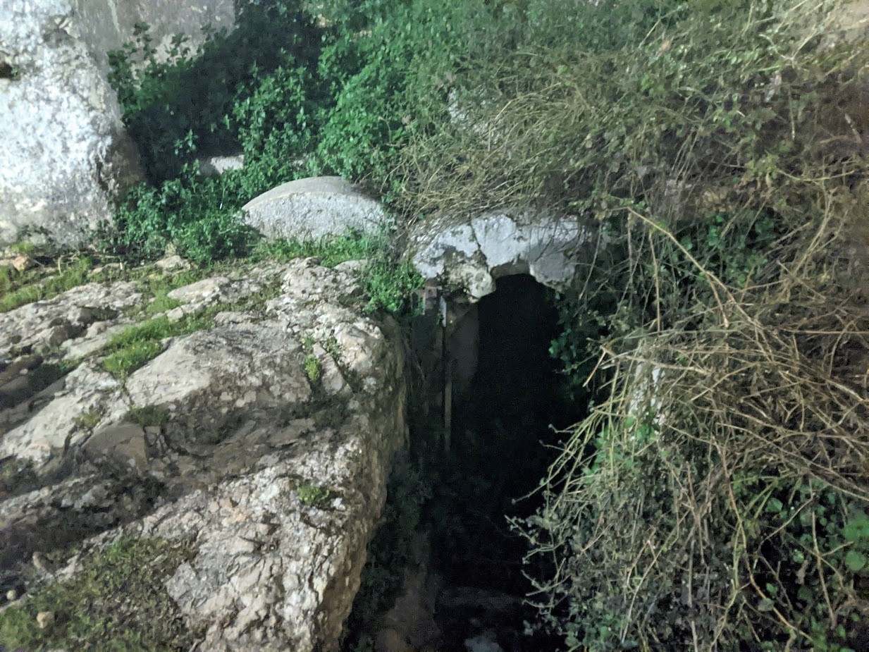 Behind the hotel, the Herod Family Tomb, which preserves a rolling stone to secure the doorway.