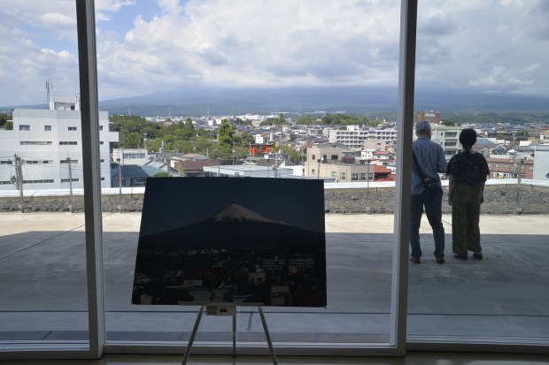 A photo at the viewing plaza showed us what the view should look like when the clouds don't get in the way.