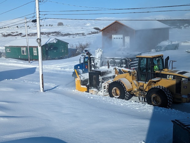 Snow removal is a regular occupation when the streets need to be cleared with another snowstorm on the way.