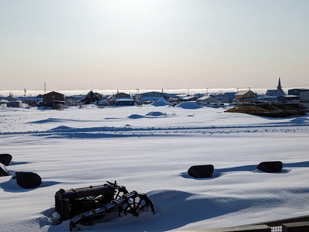 View across Nome roofs from the library/museum to a cloud bank over the Norton Sound