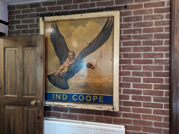 The original sign from The Eagle and Child Pub, where Lewis would meet with J.R.R. Tolkien and the other Inklings.