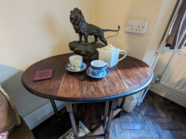 Back on the first floor, the table is set for tea.