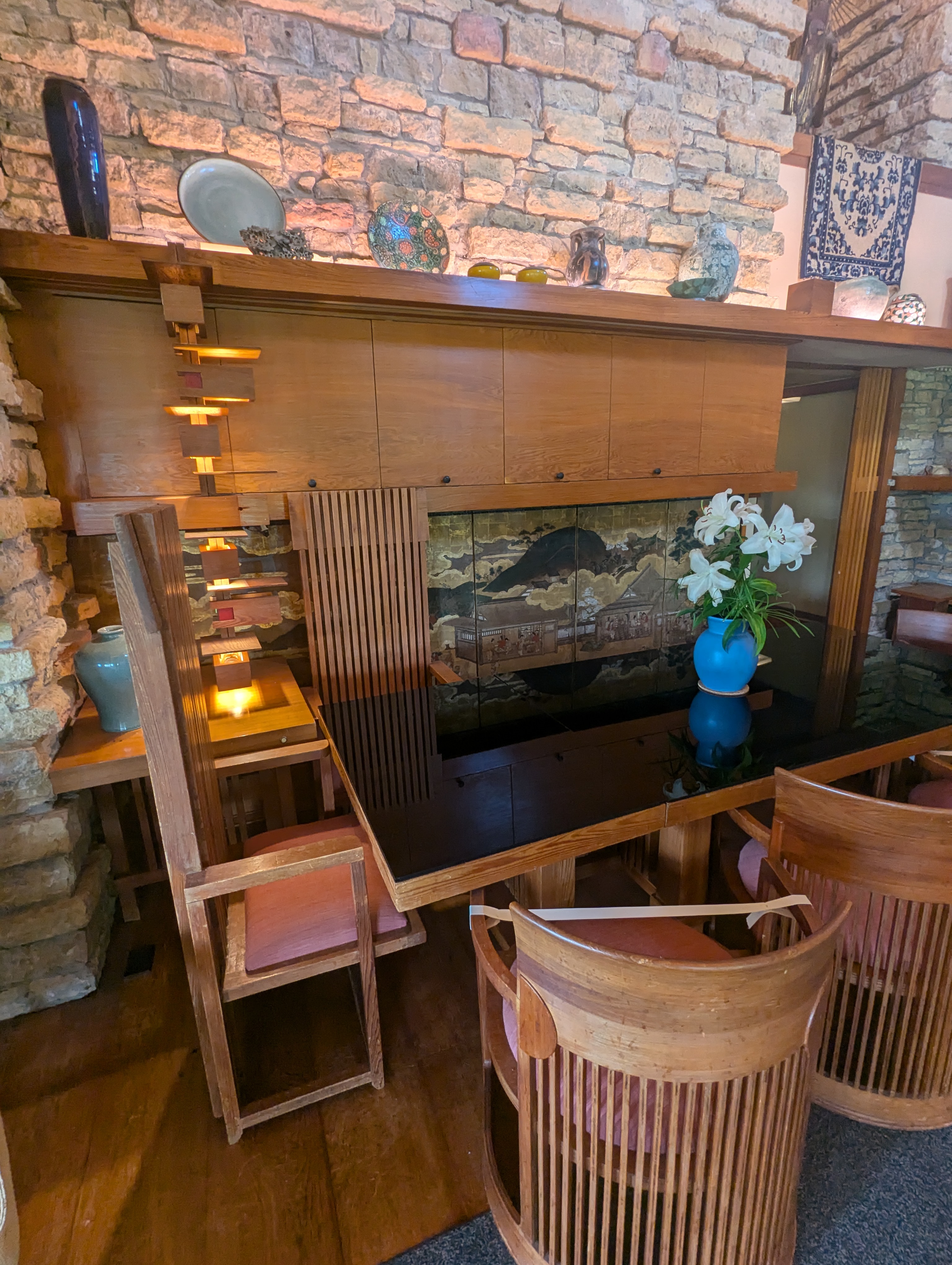 In the Living Room/Dining Room, examples of Wright's unconventional, and uncomfortable, chairs.