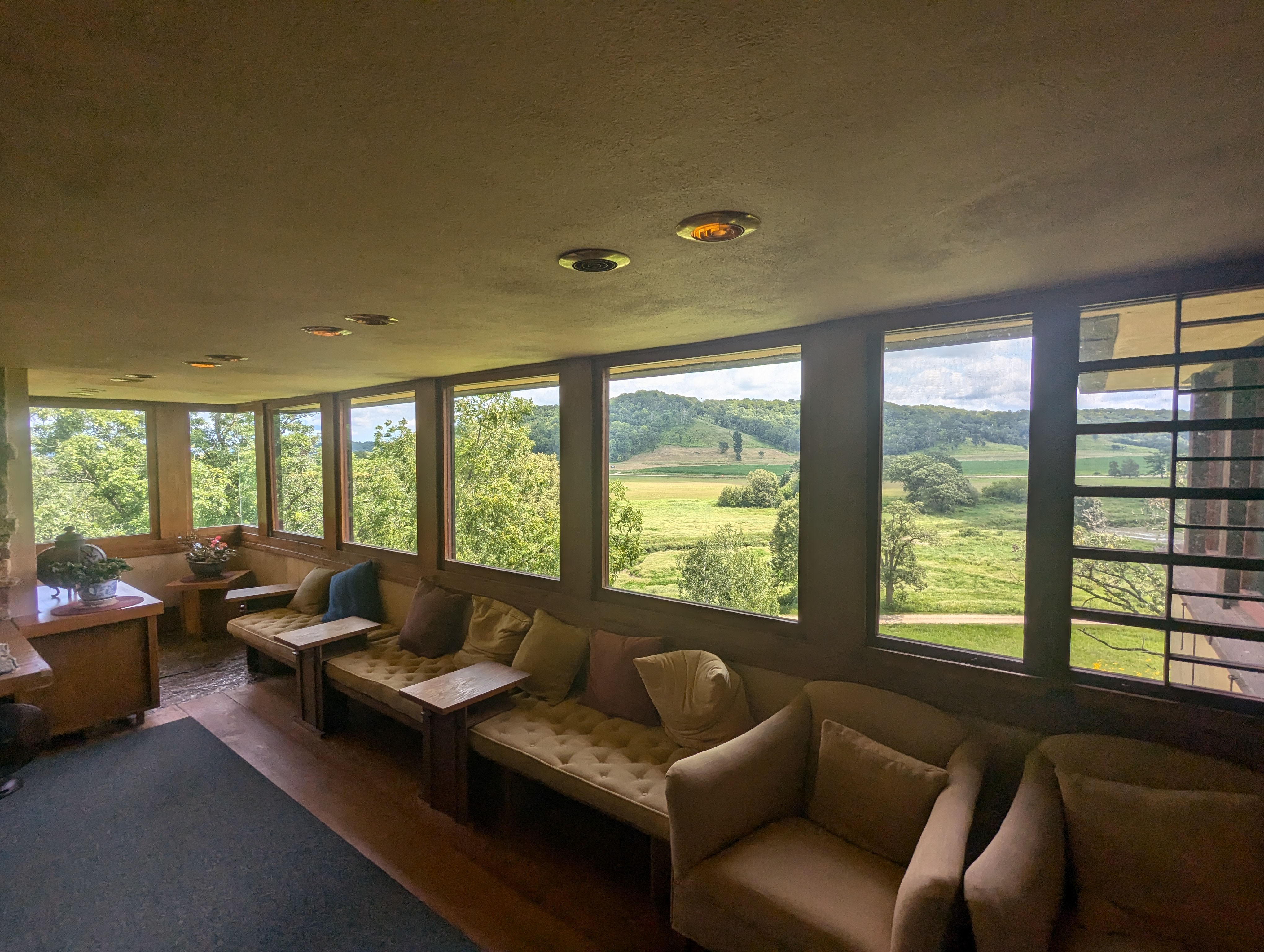 The comfortable furniture is along the walls, with expansive views of the beautiful Wyoming Valley.